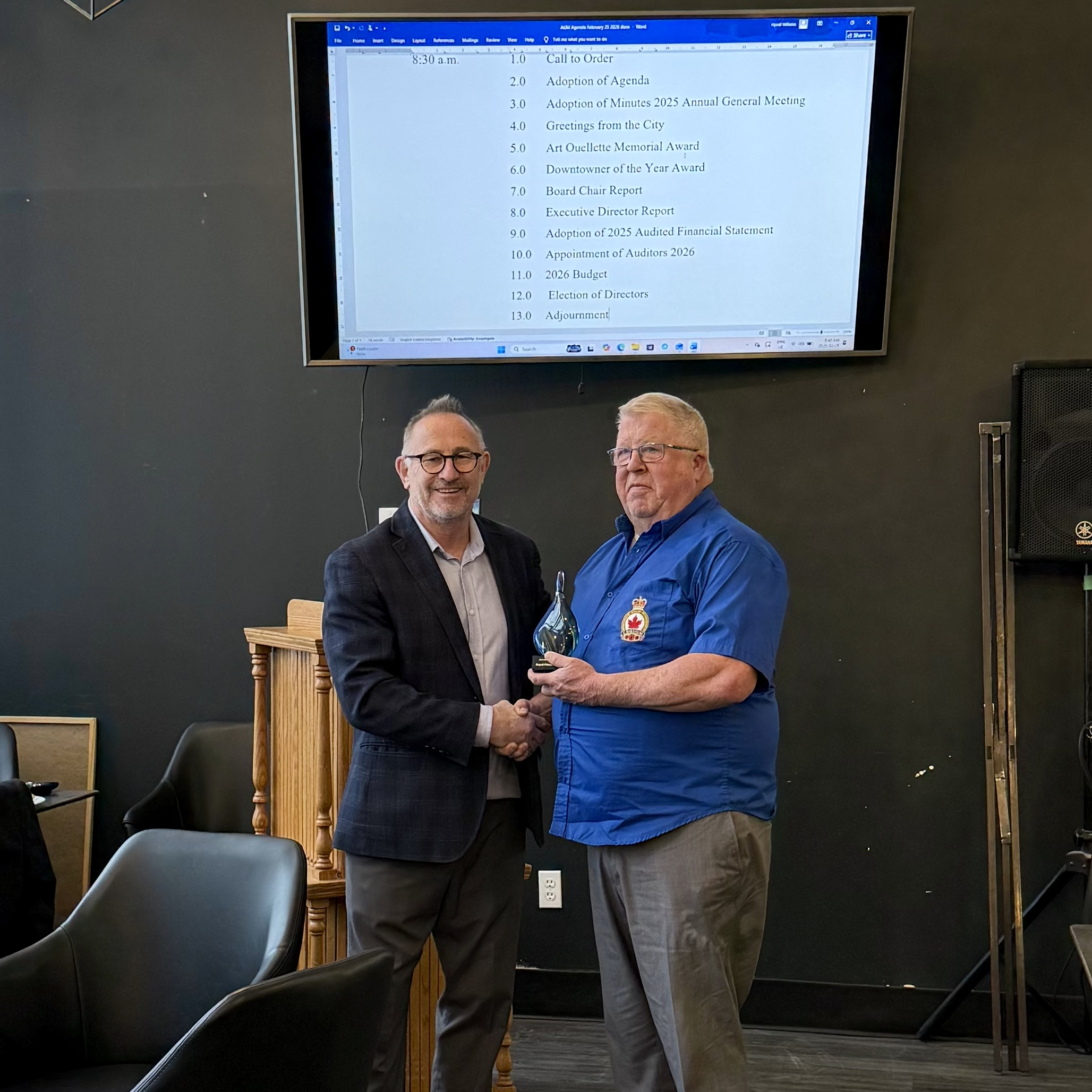 Dean Langston of the Royal Canadian Legion Branch #54 is presented the Downtowner of the Year Award.